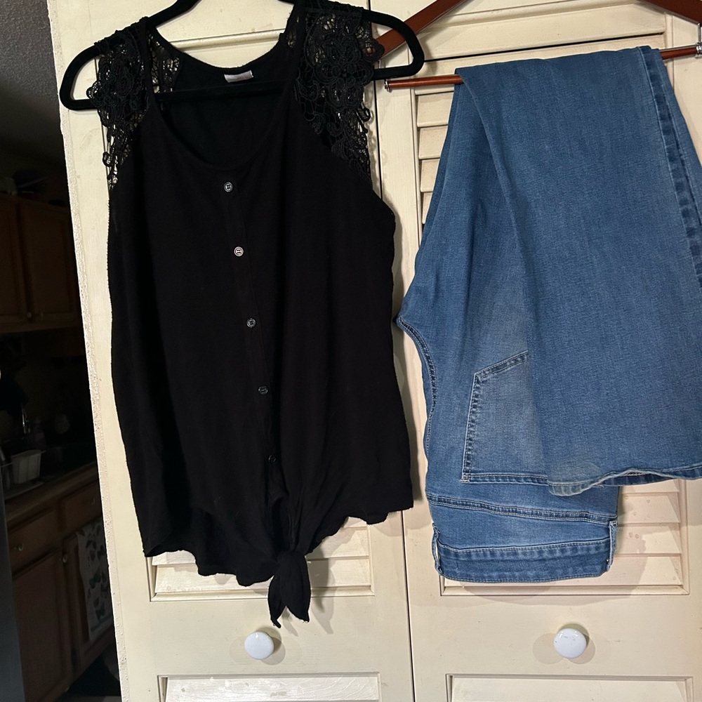 Black Lace Sleeveless Top and Blue Jeans
